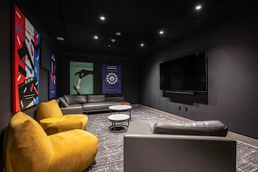 a living room filled with furniture and a flat screen tv at 220 Meridian, Indianapolis, IN, 46204