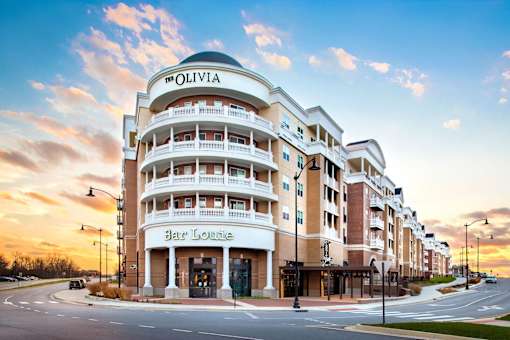 The hotel Olivia is located next to the Bar Louie. at The Olivia Apartments, Carmel, Indiana