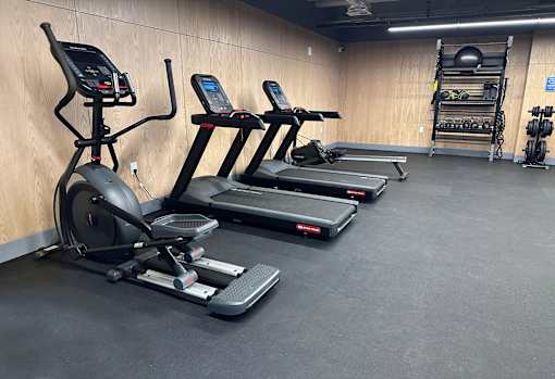 Bell Lofts Apartments Fitness Center with treadmills elliptical and exercise bike machines