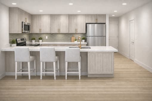 Contemporary kitchen with waterfall island and bar seating at The Maddox Apartments, New Jersey