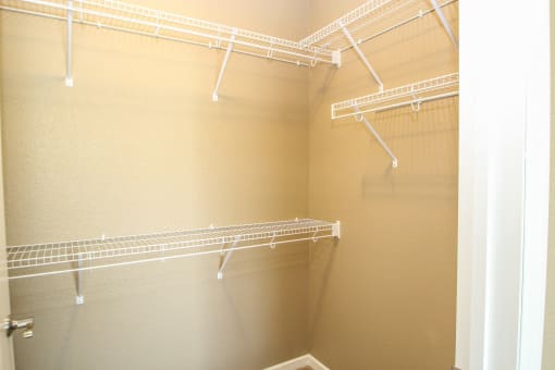 a walk in closet at The Flats at Cedar Grove, Eagan, 55122