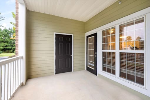 A black door is on the left and a white door is on the right.