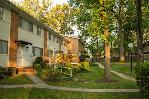 Beautiful Landscaping with Mature Trees at Prince Georgetown Apartments, Riverdale, MD