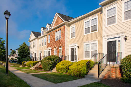 Exterior with garden at Townes at Village Center, Reisterstown