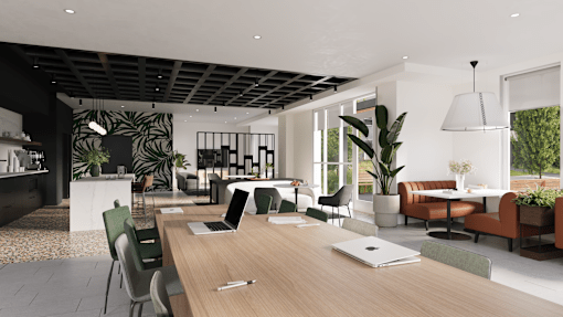 A modern office space with a long wooden table and chairs.