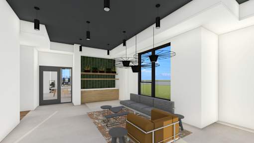 A modern interior with a glass door leading to a balcony.