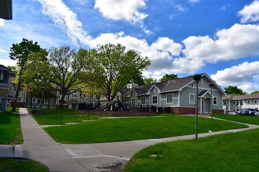 A residential area with houses and a playground.