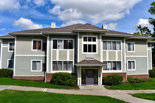A two-story building with the number 701 on the front.