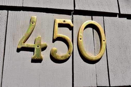 The number 2450 is displayed in gold on a grey background.