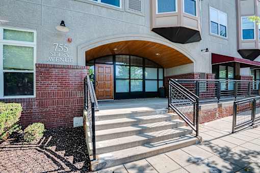 The image shows the front of a building with the number 755 and the words "Selby Avenue" on it.