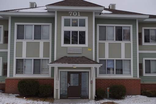 A building with the number 701 on the front.