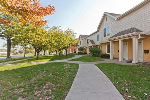 A residential area with houses and trees.