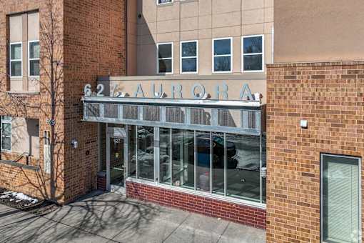 A building with a glass door and windows.