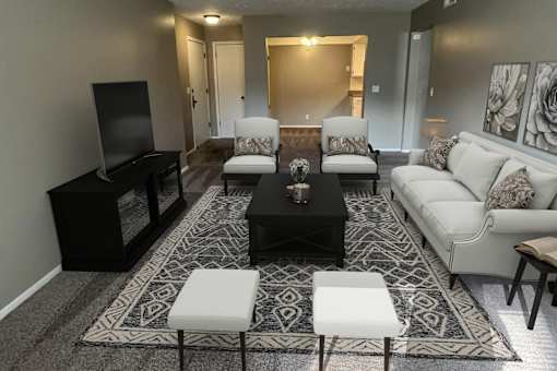 A living room with a black and white theme.