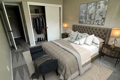 A bedroom with a large bed and a wardrobe.