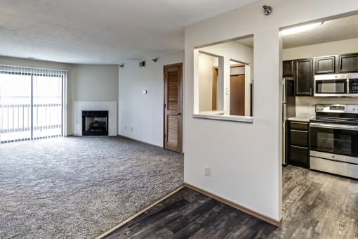 Open floor plan with fireplace at Southwest Gables Apartments, Omaha NE