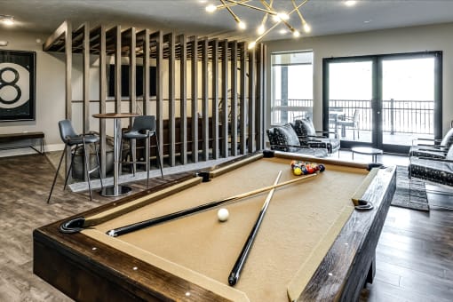 Community Recreation room with pool table at AXIS apartments in Papillion, NE