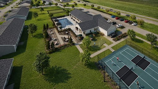 A tennis court with two players on it.