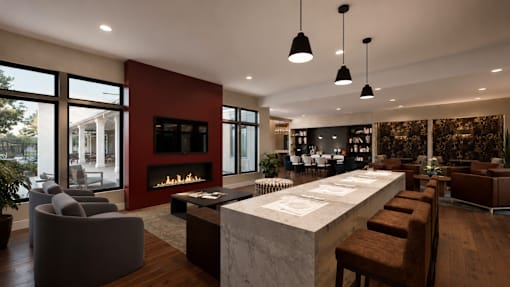A modern living room with a fireplace and a long table.