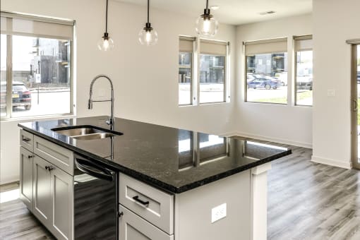 Large stylish kitchens with stainless steel appliances at Edge 204 Apartments in Omaha, NE