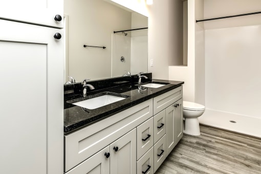 Large bathrooms with granite countertops at Edge 204 Apartments in Omaha, NE