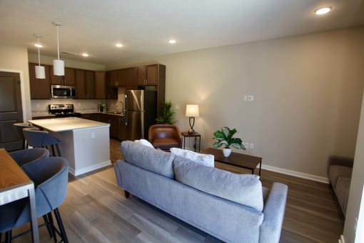 Open concept floor plans with wood plan flooring at The Flats at 5th in Columbus, NE