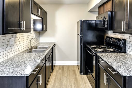 Beautiful newly-renovated one, two and three bedroom apartment townhomes with high-end finishes at Highpoint Apartments in Omaha, NE