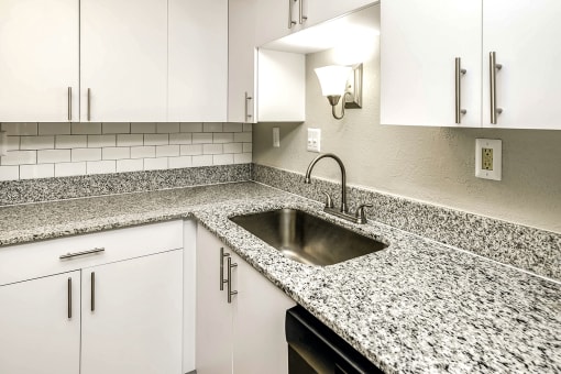 Beautiful newly-renovated one, two and three bedroom apartment townhomes with high-end finishes at Highpoint Apartments in Omaha, NE