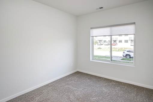 One, two and three-bedroom floor plans featuring two interior design schemes, quartz countertops, tile backsplash, stainless steel appliances, backlit mirrors, high-end finishes and more at 148 Place Apartments in Omaha, NE