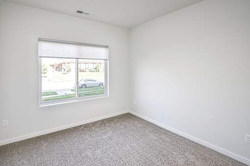 One, two and three-bedroom floor plans featuring two interior design schemes, quartz countertops, tile backsplash, stainless steel appliances, backlit mirrors, high-end finishes and more at 148 Place Apartments in Omaha, NE
