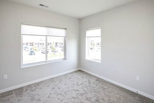One, two and three-bedroom floor plans featuring two interior design schemes, quartz countertops, tile backsplash, stainless steel appliances, backlit mirrors, high-end finishes and more at 148 Place Apartments in Omaha, NE