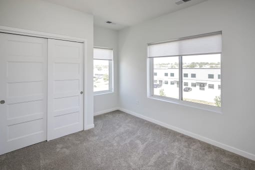 One, two and three-bedroom floor plans featuring two interior design schemes, quartz countertops, tile backsplash, stainless steel appliances, backlit mirrors, high-end finishes and more at 148 Place Apartments in Omaha, NE