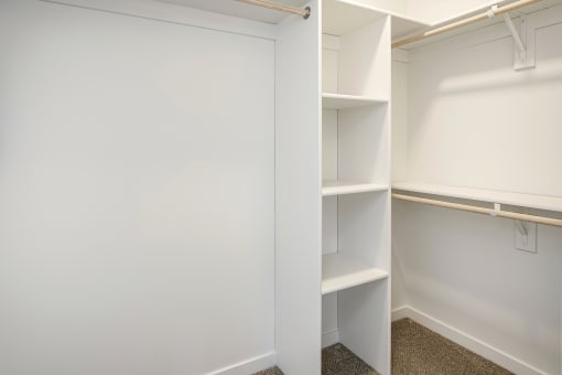 One, two and three-bedroom floor plans featuring two interior design schemes, quartz countertops, tile backsplash, stainless steel appliances, backlit mirrors, high-end finishes and more at 148 Place Apartments in Omaha, NE
