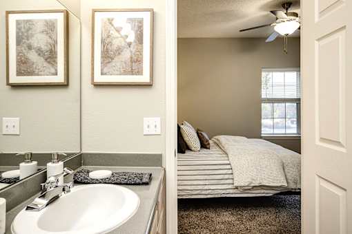 Bathroom attached with bedroom at Autumn Grove Apartments, Omaha, NE 68135