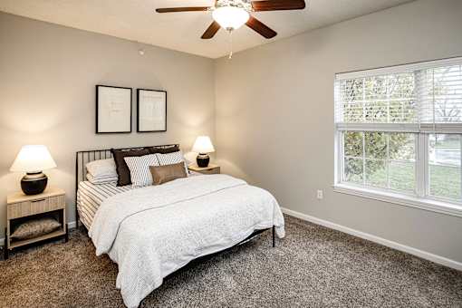 Bedroom With Expansive Windows at Autumn Grove Apartments, Nebraska, 68135