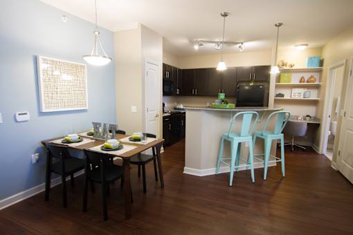 One, two, and three-bedroom apartments featuring spacious floor plans, full-sized washer and dryer, gourmet kitchens, LVP flooring and more at Aventine Wilderness Hills in Lincoln, NE