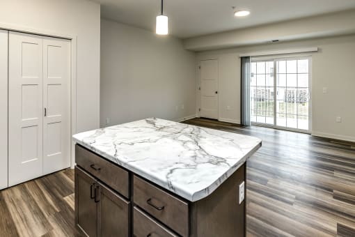 New building with white and dark color schemes with one, two and three bedroom apartment homes at CopperCreek Apartments in Council Bluffs, IA