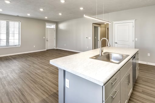 Kitchen island at Deerfield Apartments and Chateaus in Fremont, NE