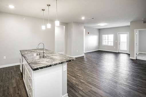Spacious Living Room at Deerfield Apartments and Chateaus in Fremont, NE