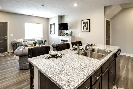 Luxury studio, one, and two bedroom apartment homes featuring granite countertops, stainless steel appliances, and fireplaces at East Lake Flats in Lincoln, NE