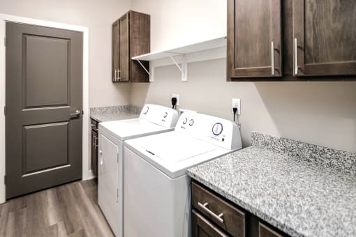 Luxury studio, one, and two bedroom apartment homes featuring granite countertops, stainless steel appliances, and fireplaces at East Lake Flats in Lincoln, NE