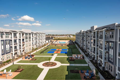State-of-the-art exterior property amenities including resort-style pool, bocce ball court, pickleball court and much more at Fireside at Waukee, in Waukee, IA