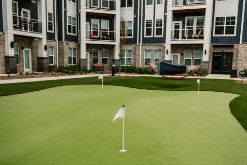 State-of-the-art exterior property amenities including resort-style pool, bocce ball court, pickleball court and much more at Fireside at Waukee, in Waukee, IA