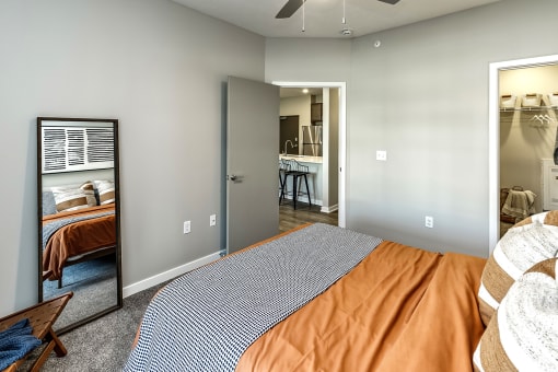 Bedroom with carpeted flooring at Hanover Flats in Bennington, NE