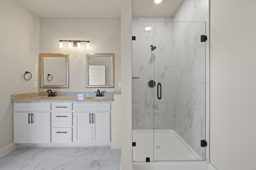 Three-bedroom townhomes featuring stainless steel appliances, premium LVT flooring, two car garage and much more at Hawthorne Row Townhomes in Bentonville, AR