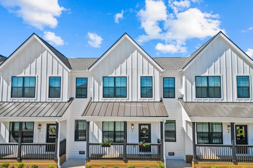 Three-bedroom townhomes featuring stainless steel appliances, premium LVT flooring, two car garage and much more at Hawthorne Row Townhomes in Bentonville, AR