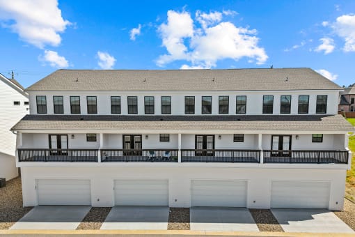 Three-bedroom townhomes featuring stainless steel appliances, premium LVT flooring, two car garage and much more at Hawthorne Row Townhomes in Bentonville, AR