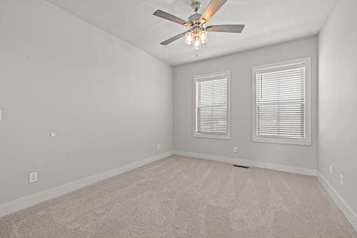 Three-bedroom townhomes featuring stainless steel appliances, premium LVT flooring, two car garage and much more at Hawthorne Row Townhomes in Bentonville, AR