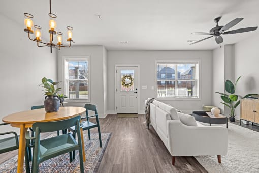 Three-bedroom townhomes featuring stainless steel appliances, premium LVT flooring, two car garage and much more at Hawthorne Row Townhomes in Bentonville, AR