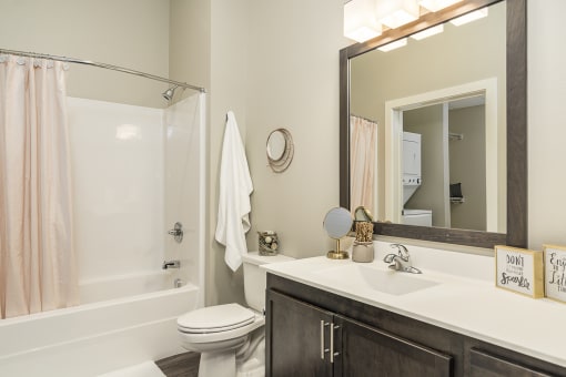 One and two bedroom hi-end apartment homes featuring Energy-Efficient Stainless Steel Appliances,  Granite Kitchen Island, dark cabinets, and much more at The Nexus at Gray's Landing in Downtown Des Moines, IA